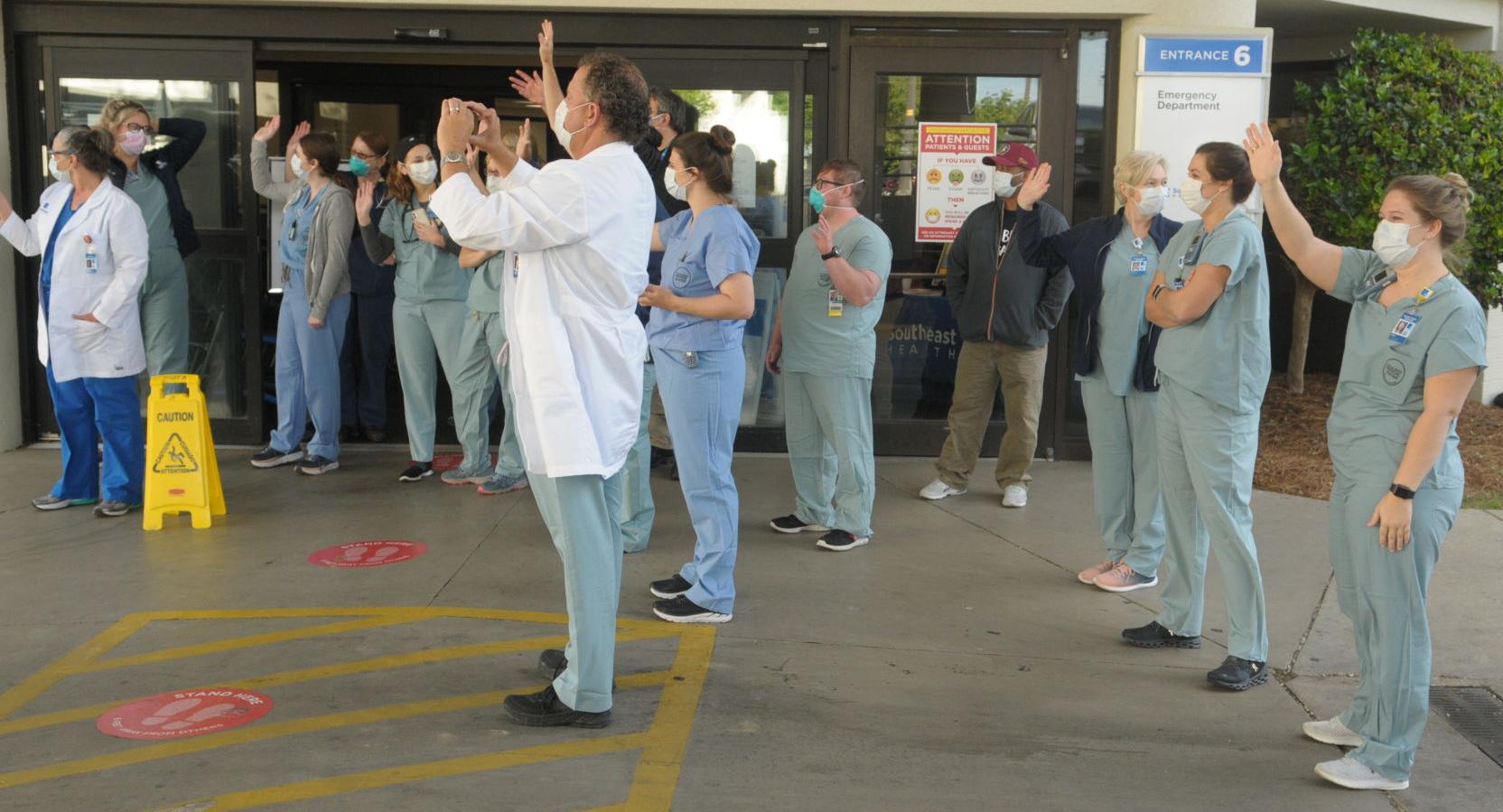 First responders give rolling salute to local health care workers